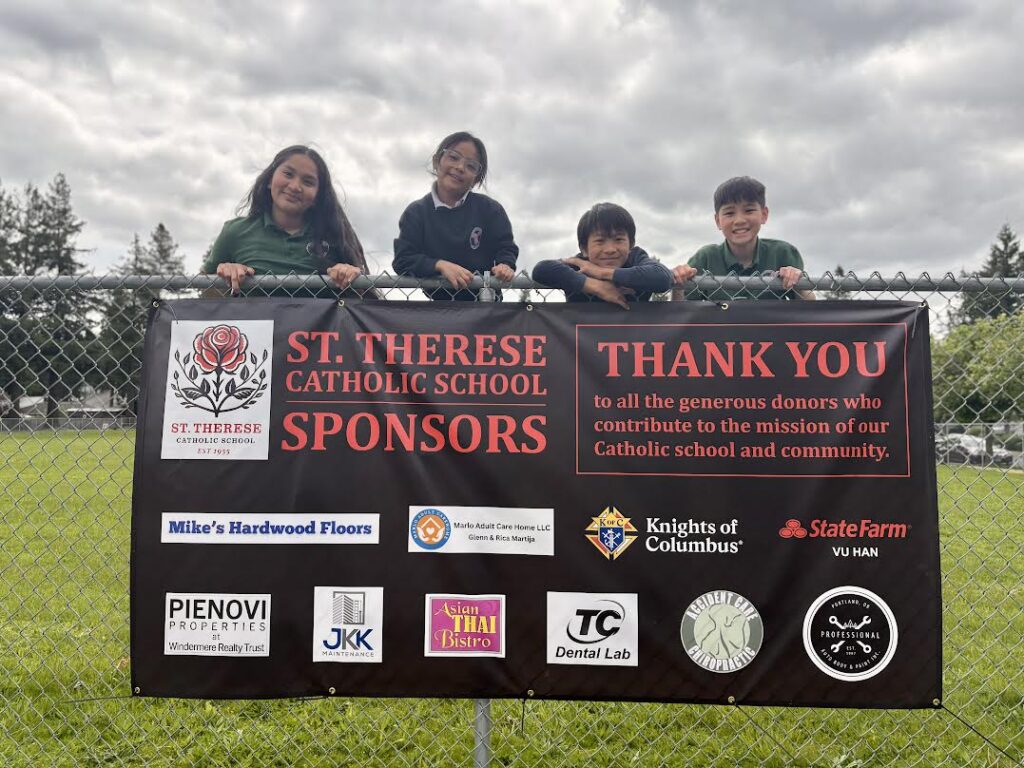 kids behind a thank you banner with st therese school's sponsors